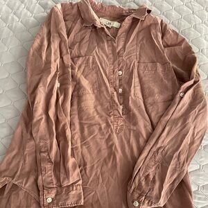 Blush color shirt. V-neck, 3 button, roll sleeve.